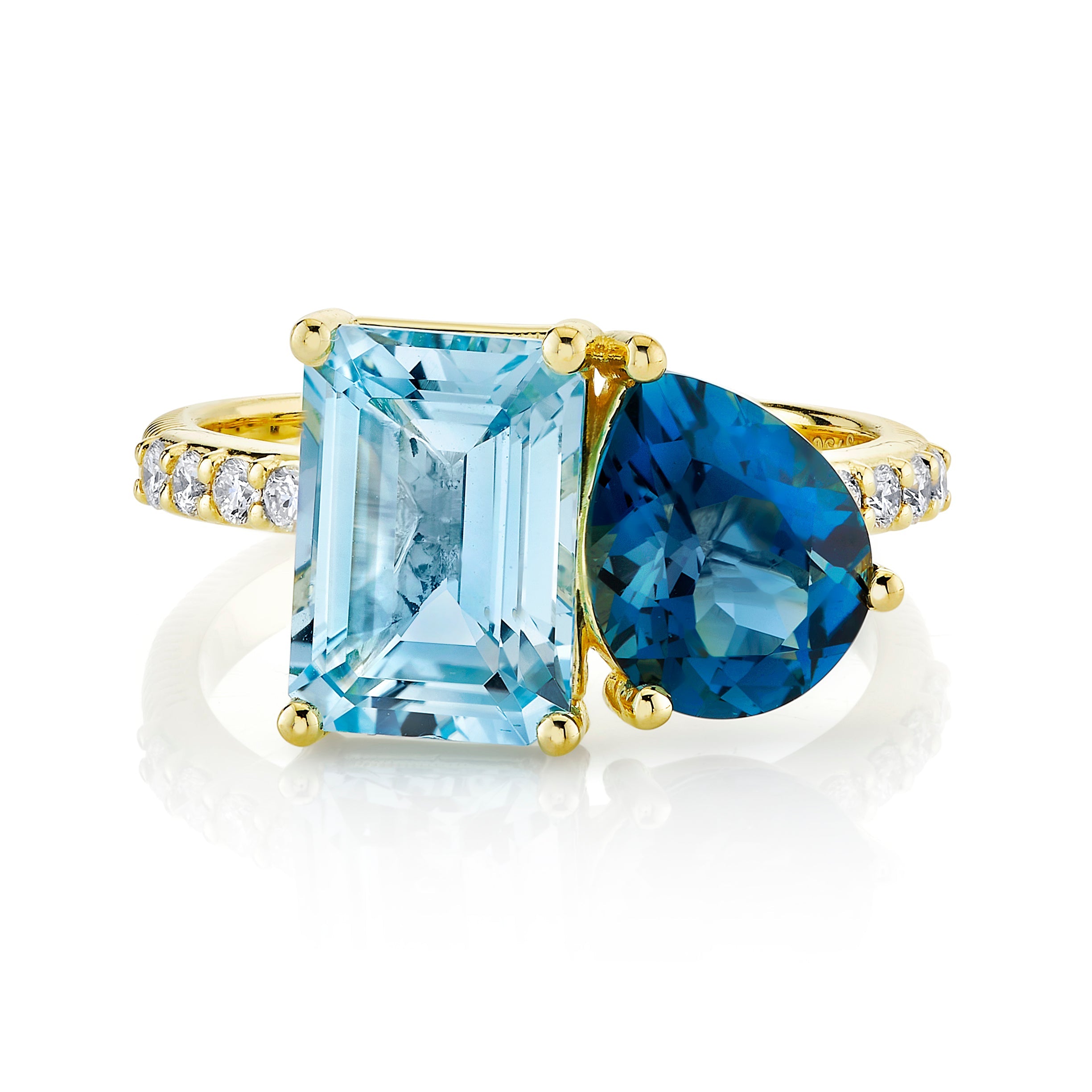 Toi et Moi Pear and Emerald Cut Blue Topaz Ring
